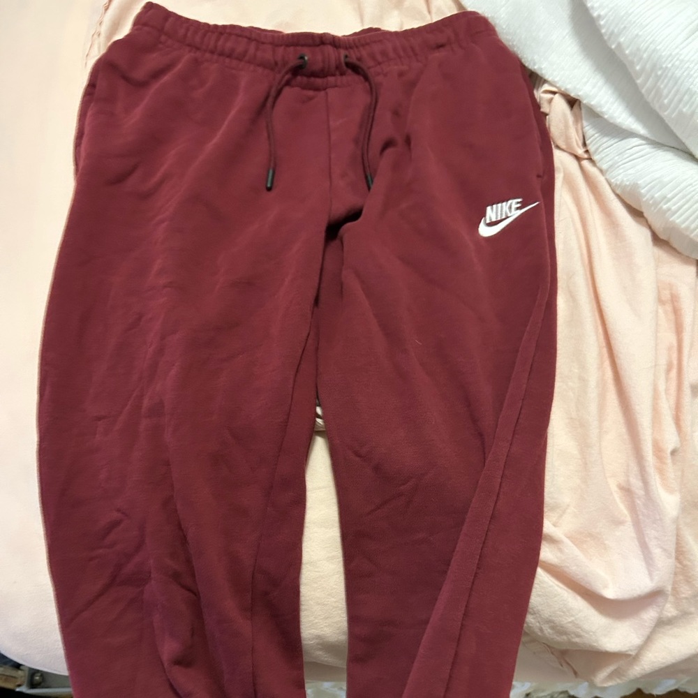 Burgundy Nike sweatpants
